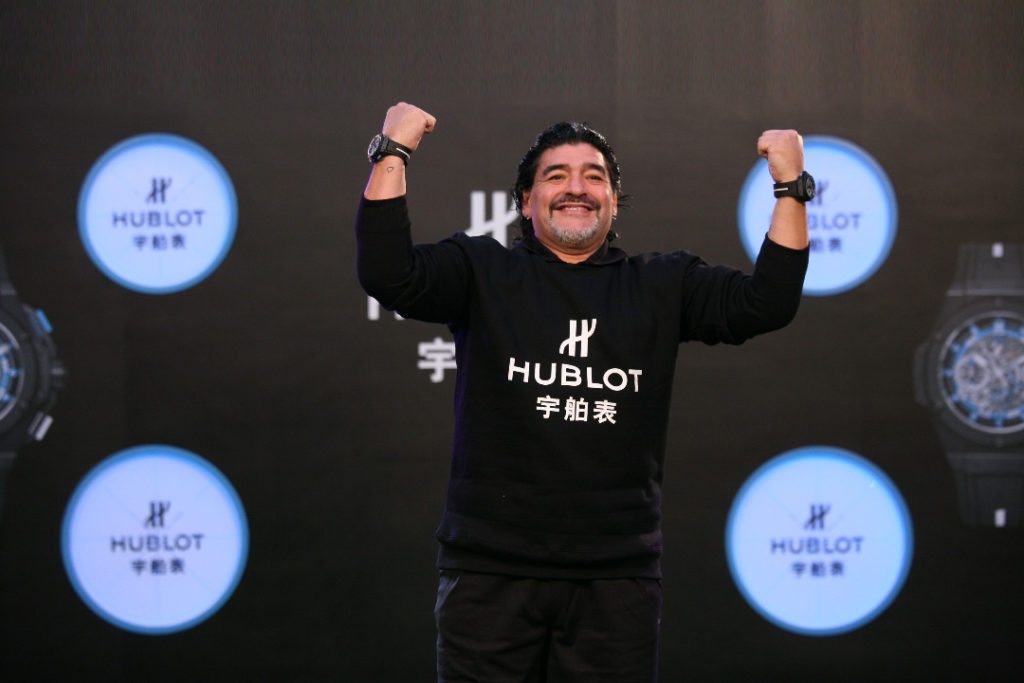 Diego Maradona showing off his both Hublot King …12 front