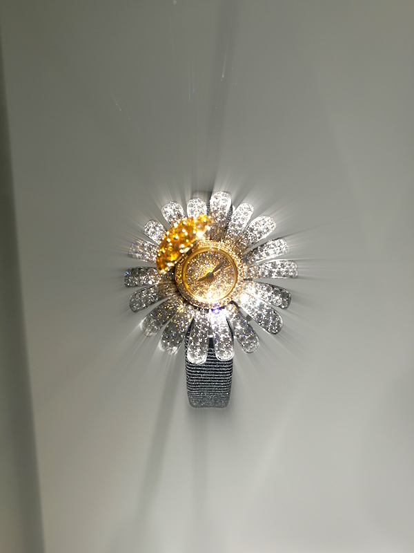 The beautiful diamond flower watch with Yellow diamond centre. Marguerite Secrète watch from SIHH 2018