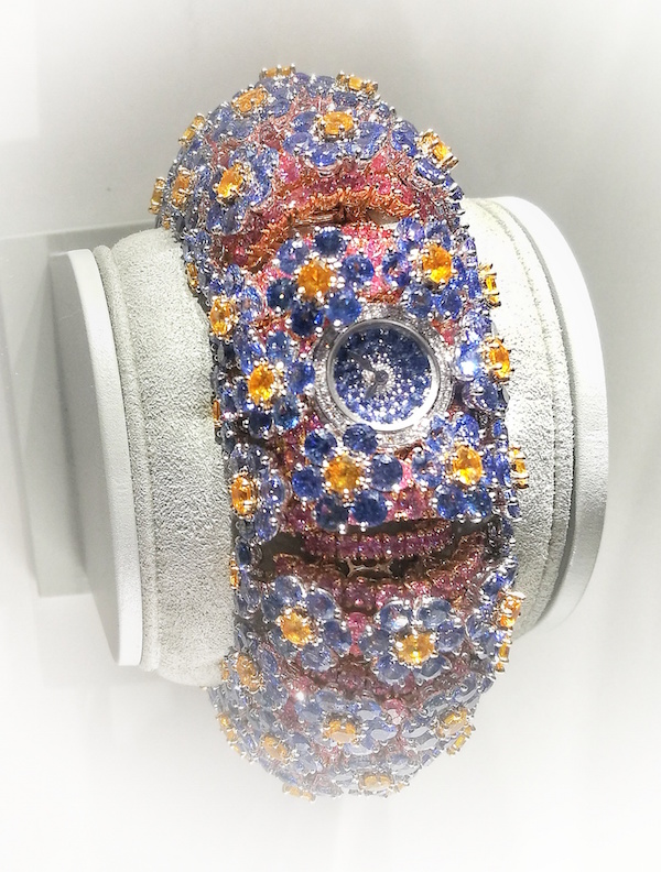 The Forget Me Not watch from SIHH 2018. Myosotis watch with just 12mm diameter dial in white gold, round blue sapphires.